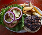 Phoenix Saloon's thick and juicy premium Angus Burgers cooked to order.